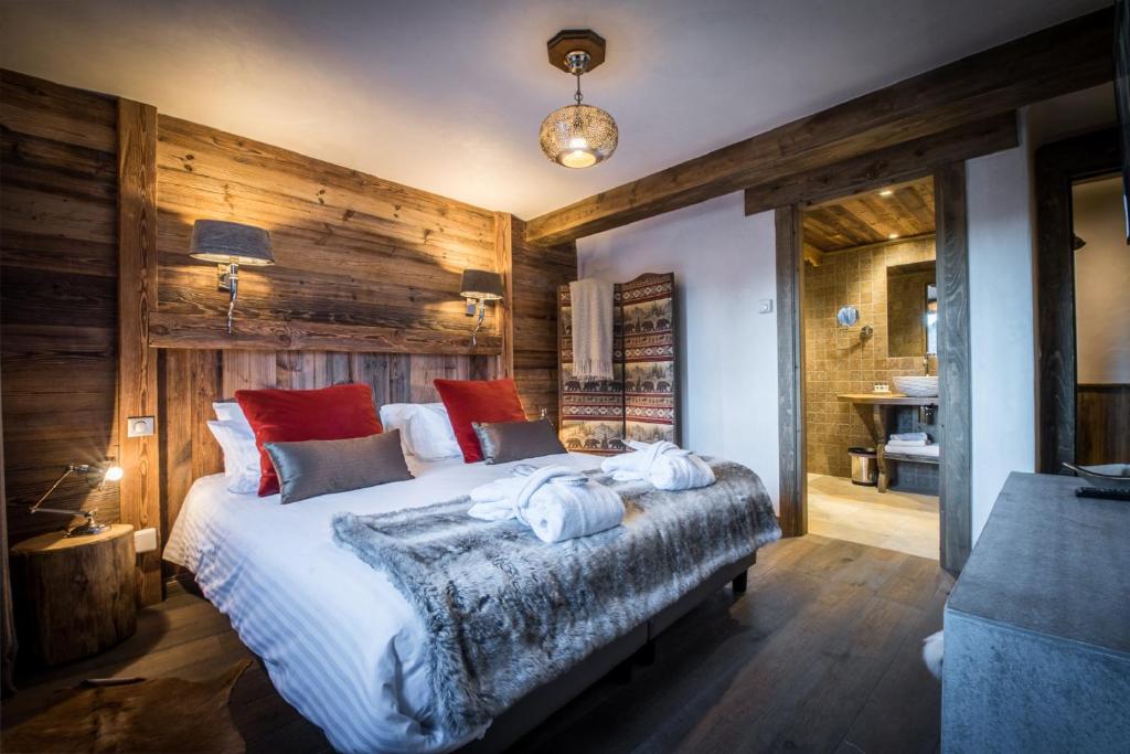Postel nebo postele na pokoji v ubytování CHALET L'ETAGNE