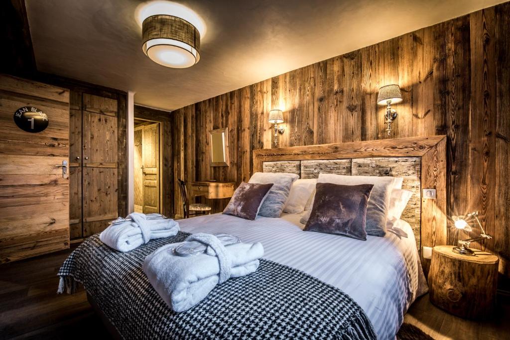 Postel nebo postele na pokoji v ubytování CHALET L'ETAGNE