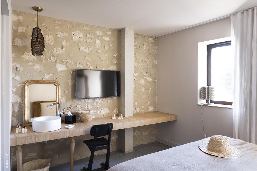Postel nebo postele na pokoji v ubytování Le 19-21 - Un amour d'hotel