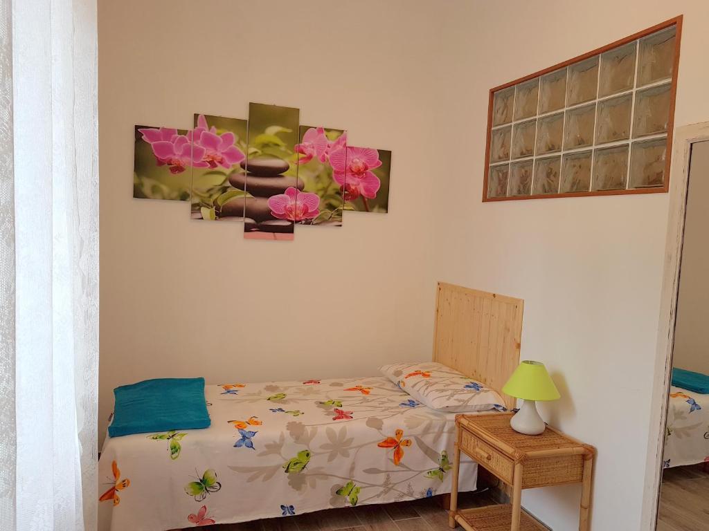 A bed or beds in a room at A Casa Di Clementina