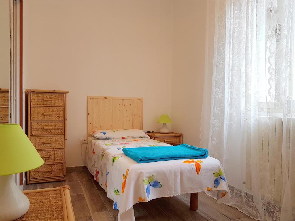 A bed or beds in a room at A Casa Di Clementina