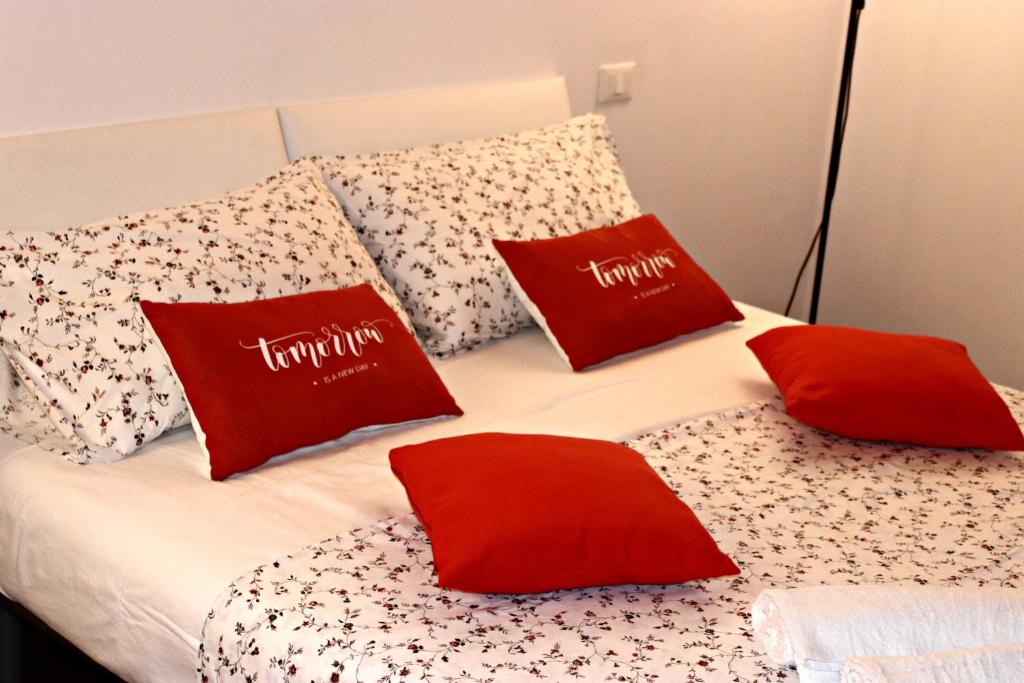 Katil atau katil-katil dalam bilik di La Casetta di Clara