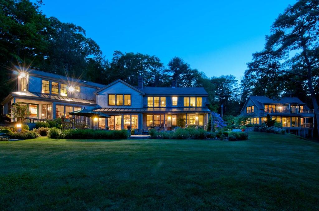 a large house at night with lights at Coveside Bed & Breakfast in Georgetown