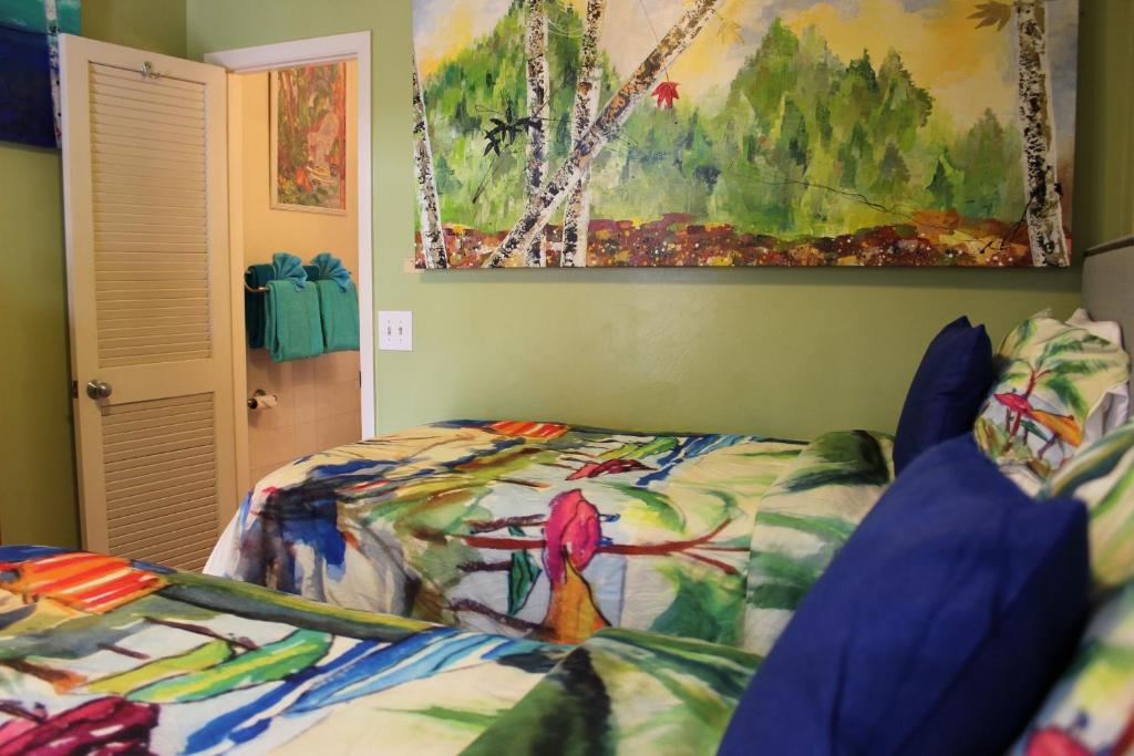 Postel nebo postele na pokoji v ubytování Caribbean House