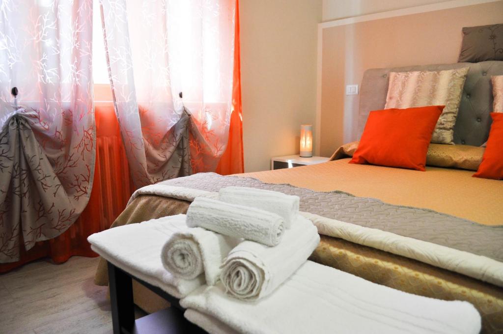 Postel nebo postele na pokoji v ubytování SuiteIRIS B&B
