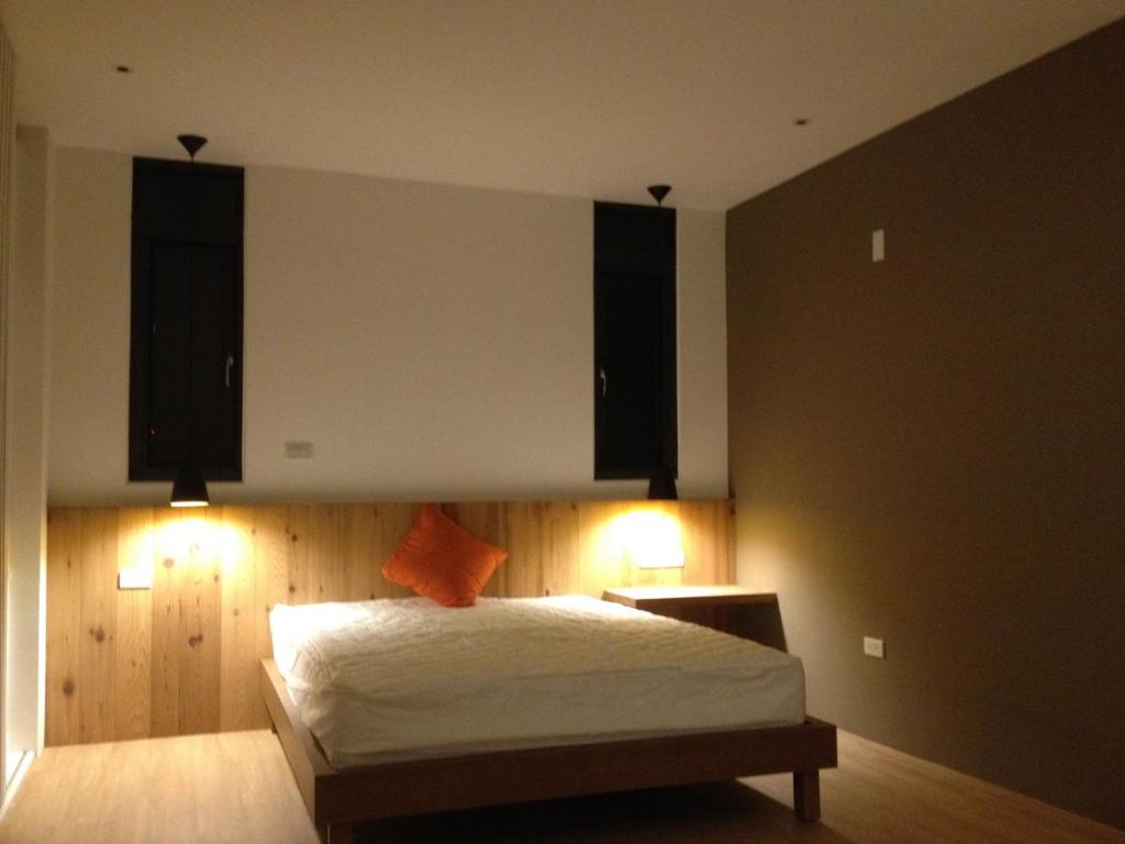 Postel nebo postele na pokoji v ubytování Tall House