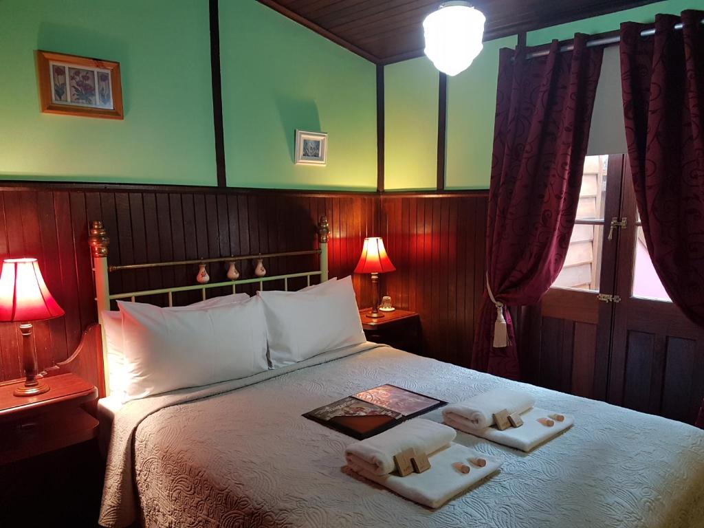 Postel nebo postele na pokoji v ubytování Bridgefield Guest House