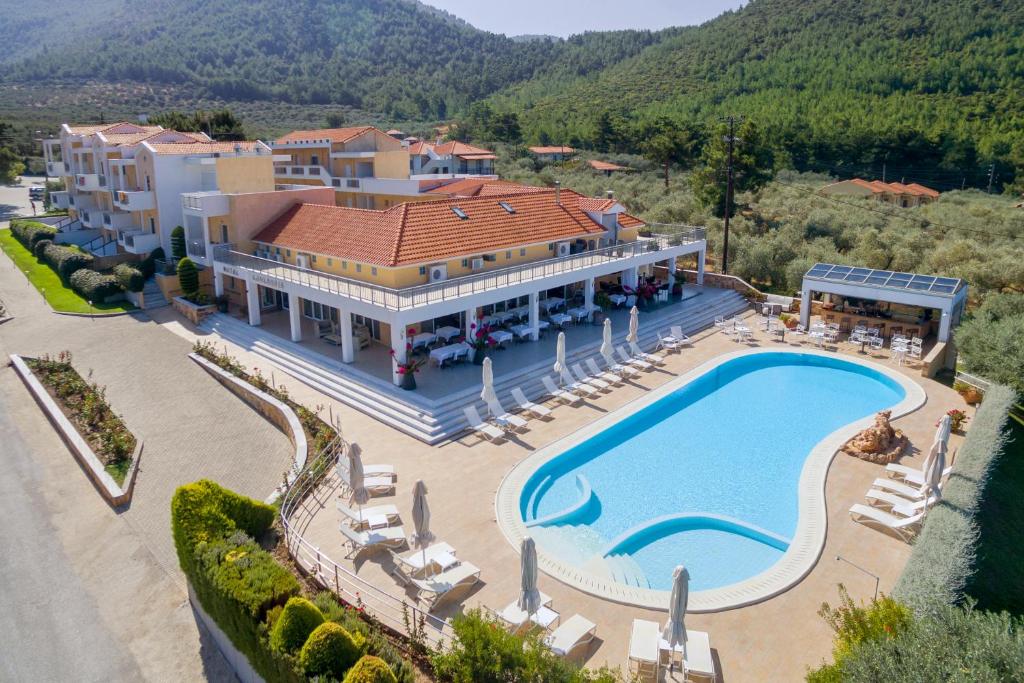 an aerial view of a villa with a swimming pool at Louloudis Boutique Hotel in Skala Rachoniou