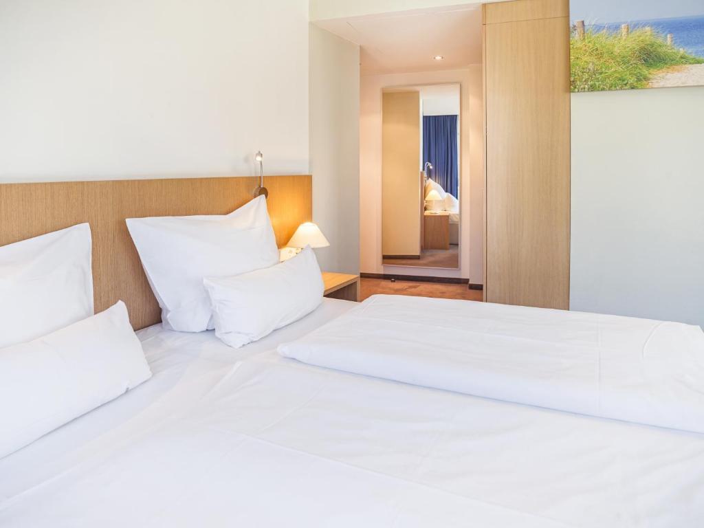 Postel nebo postele na pokoji v ubytování Hotel Berlin Mitte by Campanile