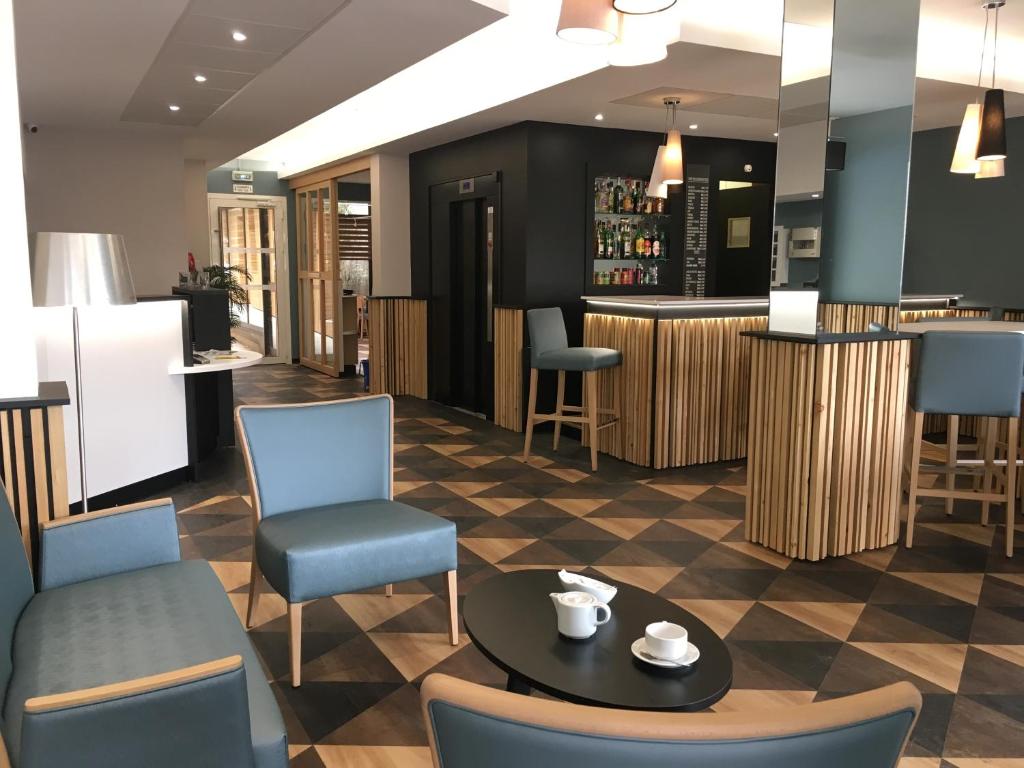 Posezení v ubytování Hôtel Icare