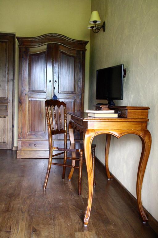 TV a/nebo společenská místnost v ubytování La Casona de Torió