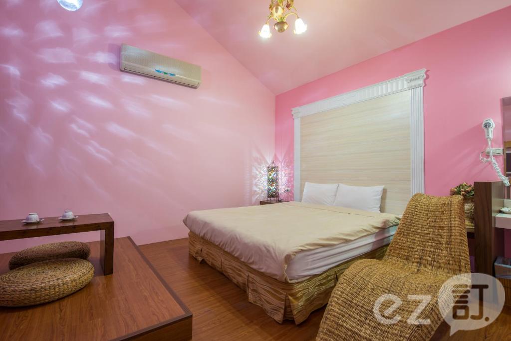 Postel nebo postele na pokoji v ubytování Red Sun