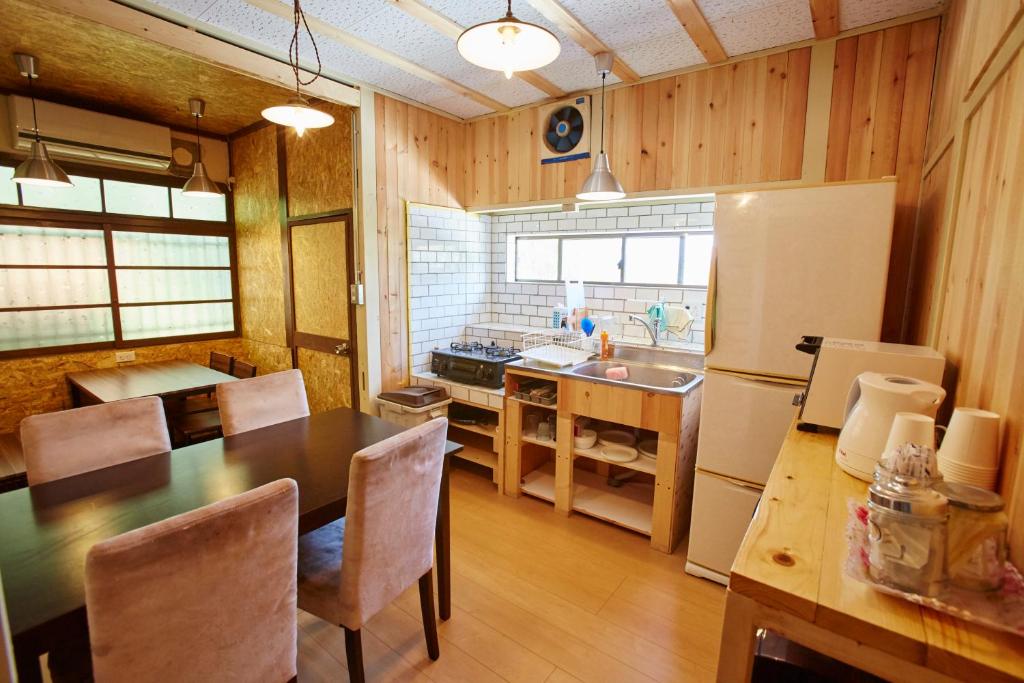 Kuchyň nebo kuchyňský kout v ubytování Guest House Preta Torami