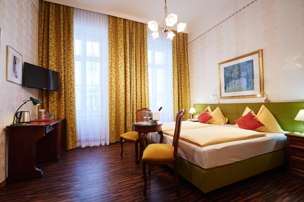 Postel nebo postele na pokoji v ubytování Hotel Austria - Wien