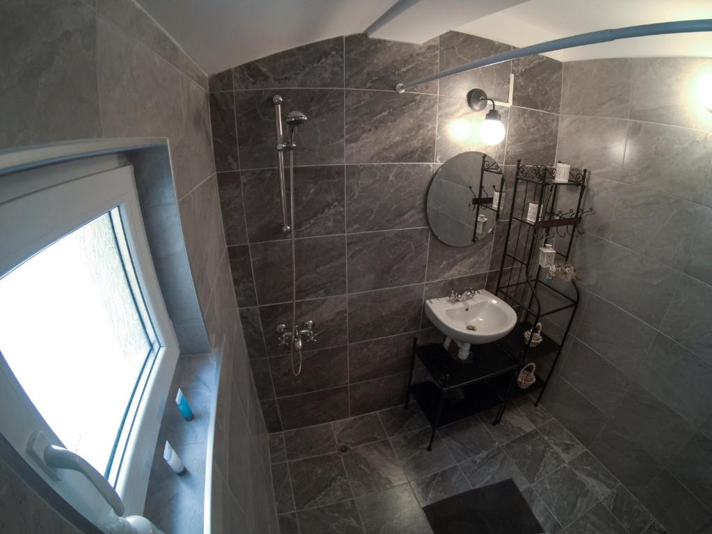Koupelna v ubytování Graf Ignatiev - 3BR APART