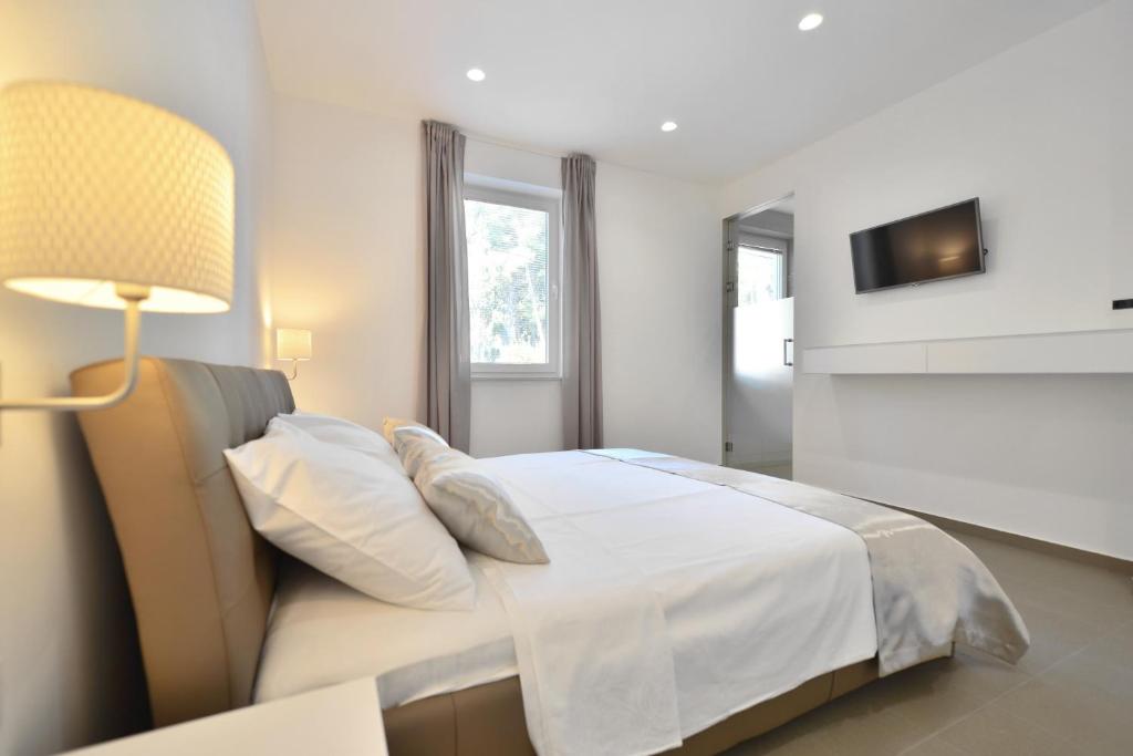 Posteľ alebo postele v izbe v ubytovaní Chiponsky One - 5 star beachfront property
