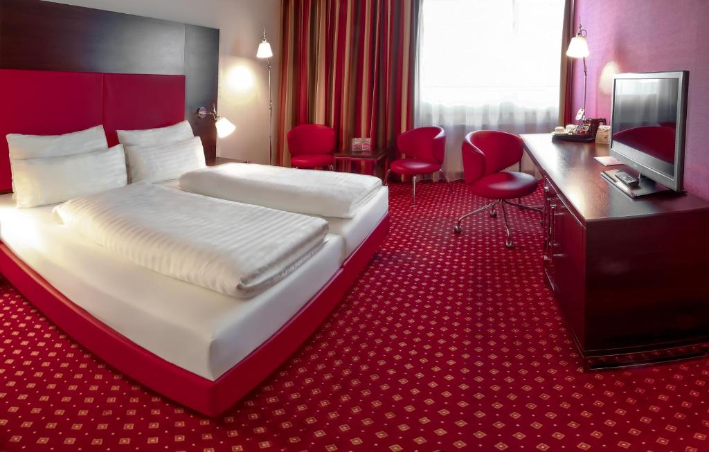 TV a/nebo společenská místnost v ubytování Best Western Plaza Hotel Wels