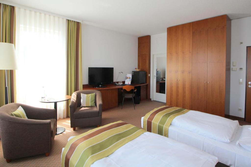 TV a/nebo společenská místnost v ubytování Hansa Apart-Hotel Regensburg