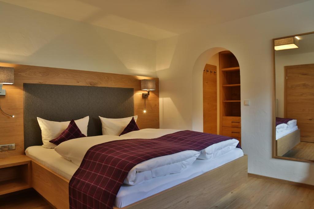 Rúm í herbergi á Haus Waldheim