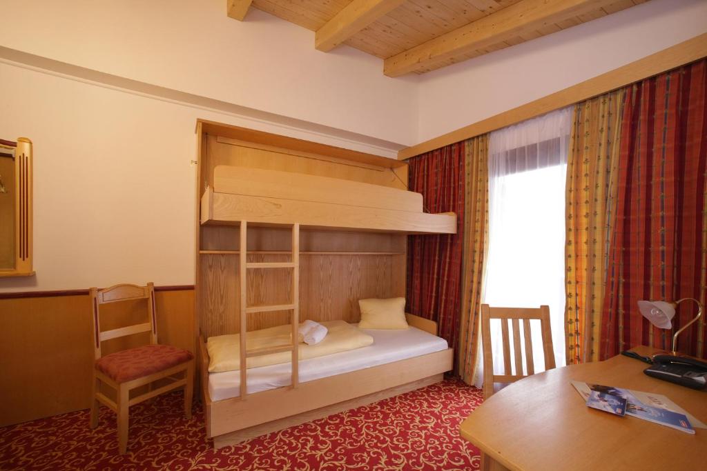 Postel nebo postele na pokoji v ubytování Altachhof Hotel und Ferienanlage - Jokercard im Sommer inklusive
