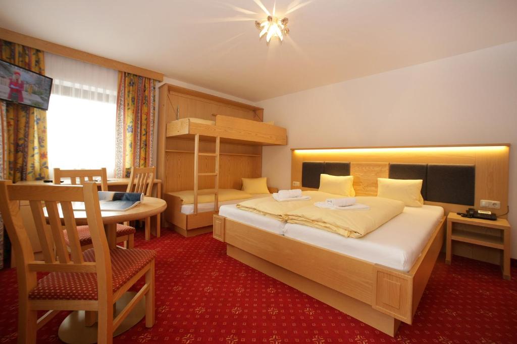Postel nebo postele na pokoji v ubytování Altachhof Hotel und Ferienanlage - Jokercard im Sommer inklusive