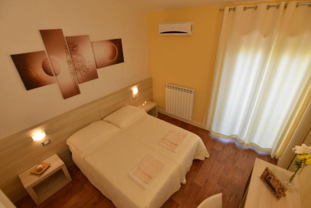 Postel nebo postele na pokoji v ubytování B&B Portacastello