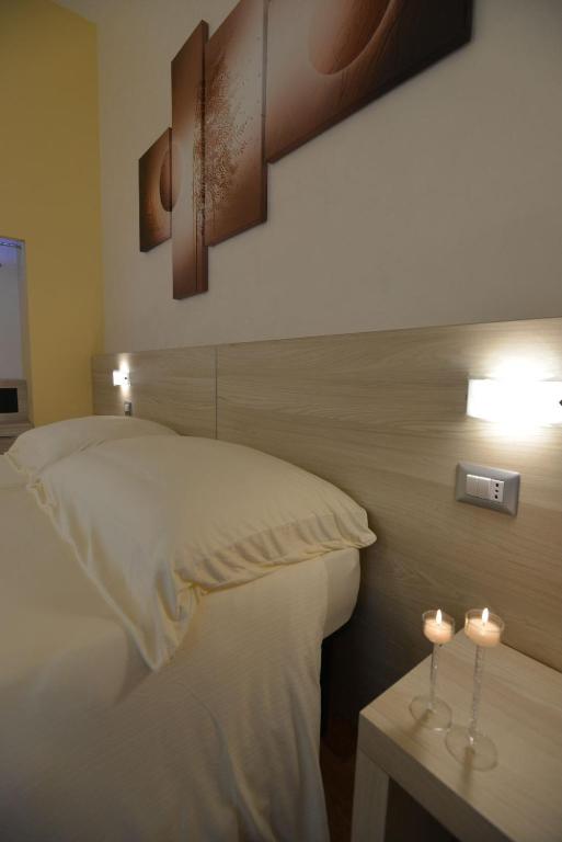 Postel nebo postele na pokoji v ubytování B&B Portacastello