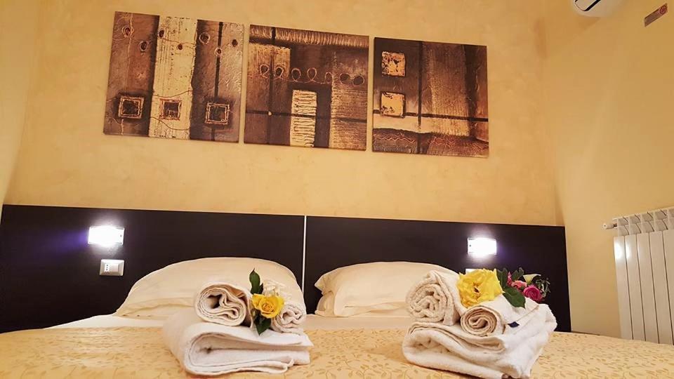 Postel nebo postele na pokoji v ubytování B&B Portacastello