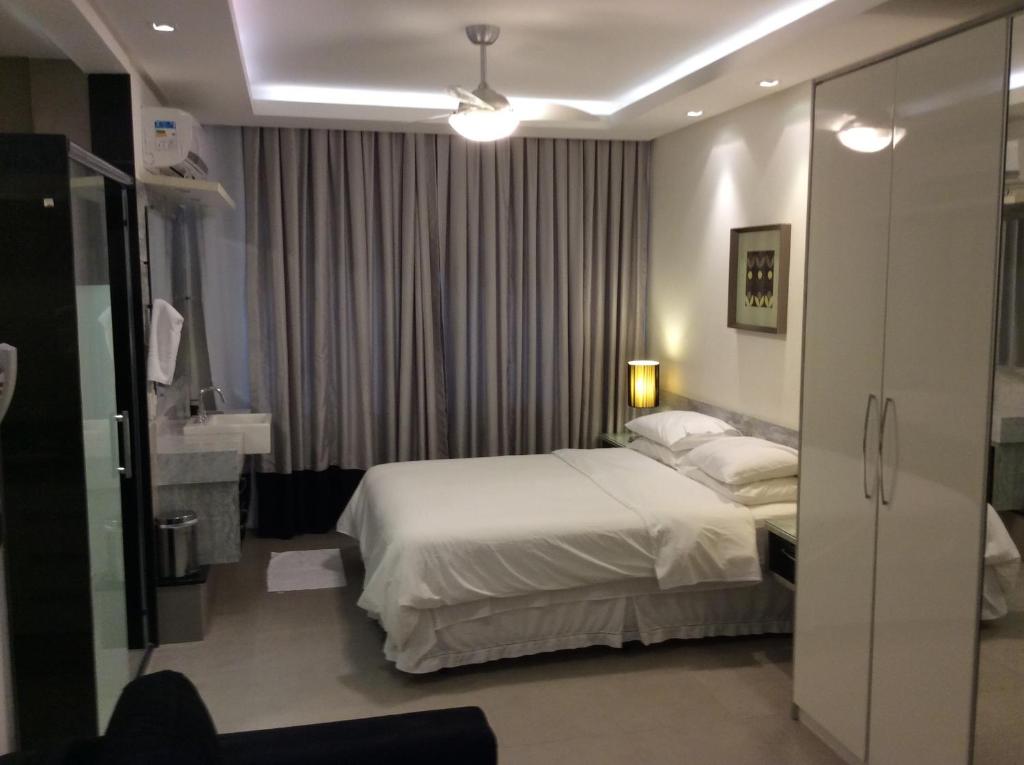 En eller flere senge i et værelse på Condo Ipanema 503