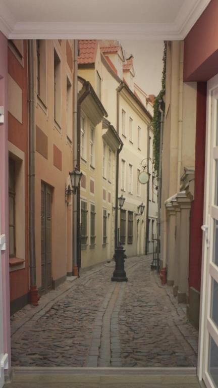 a view of an empty street in a city at Hostel Zolota Nyva in Chortkiv