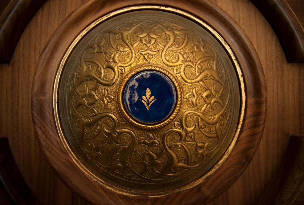 a wooden door with a gold and blue design on it at Romance Istanbul Hotel Boutique Class in Istanbul