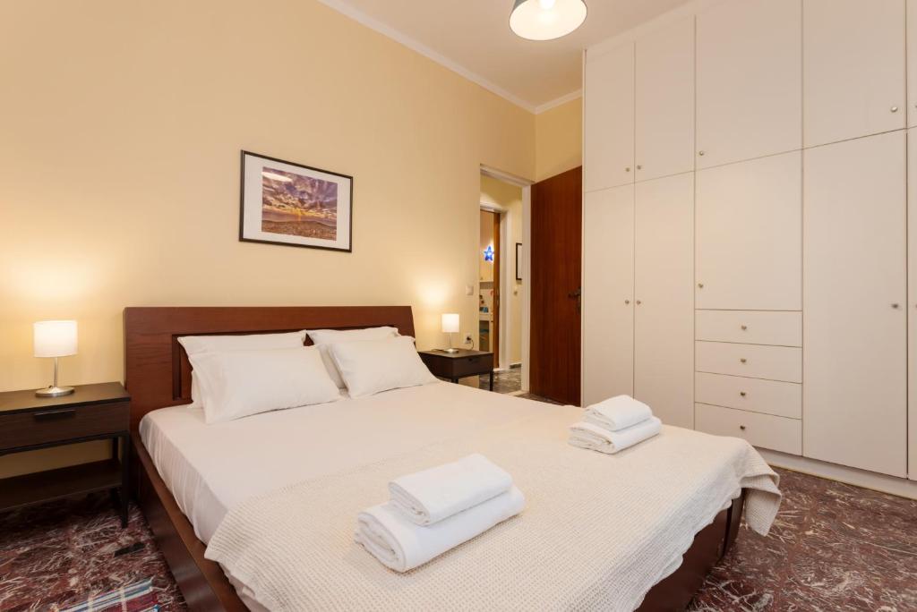 Postel nebo postele na pokoji v ubytování Metropolis Apartment - 150m from St Marcus Square, by ZanteWize