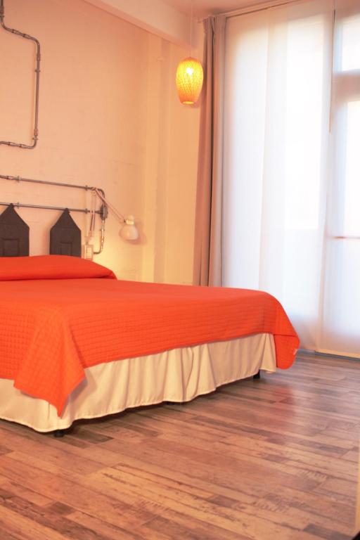 Postel nebo postele na pokoji v ubytování BB SharingLoft Sirmione