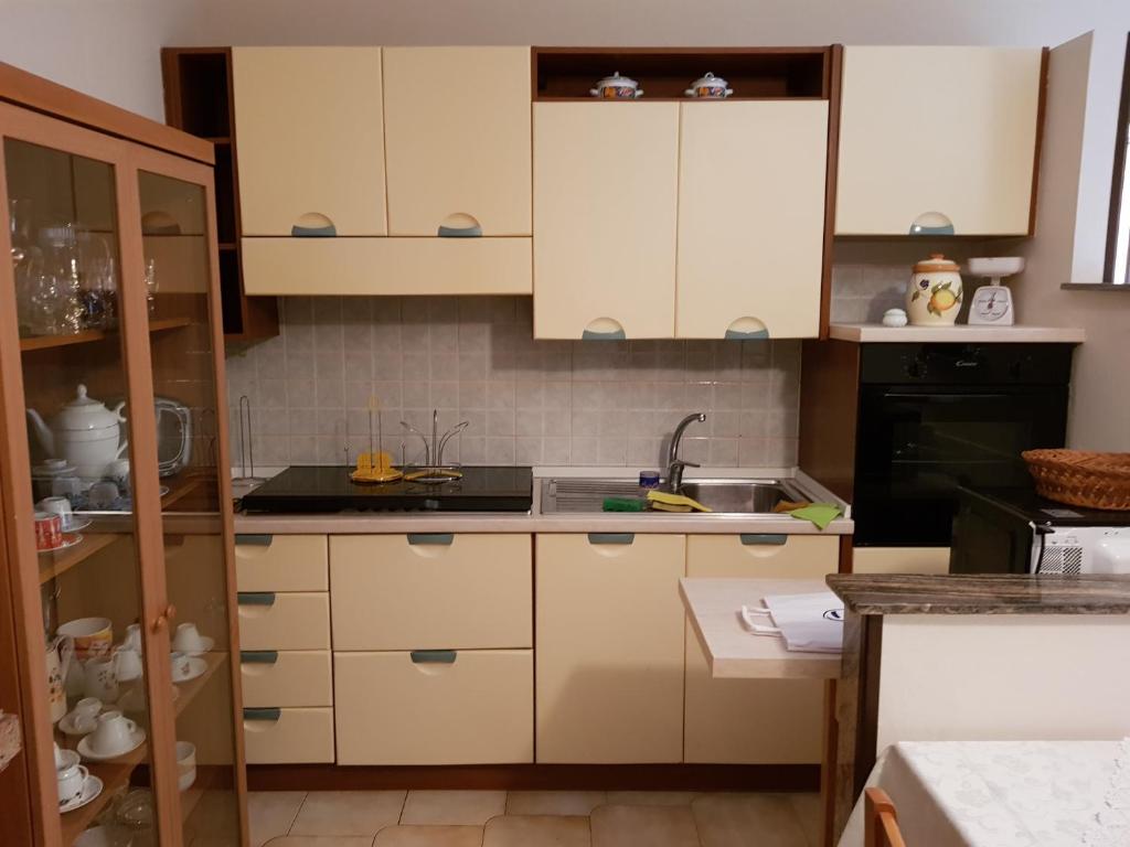 Kuchyň nebo kuchyňský kout v ubytování B&B Via Roma