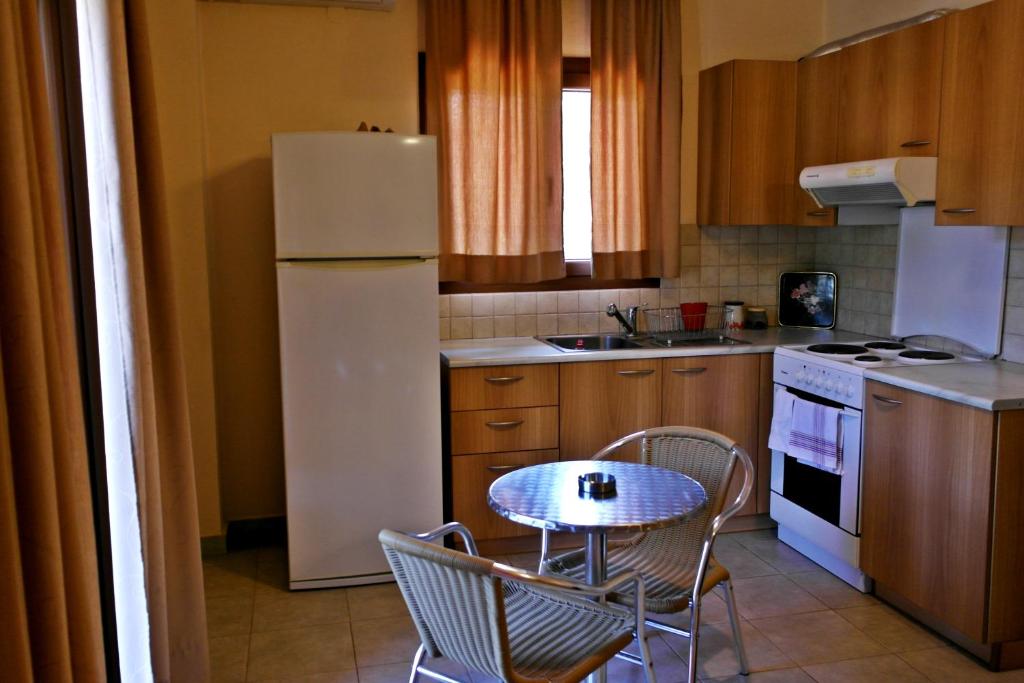 Kuchyň nebo kuchyňský kout v ubytování Roula Rooms