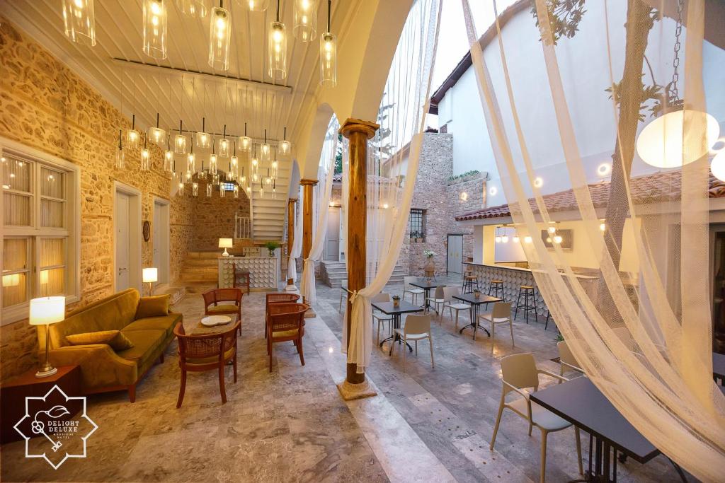 Posezení v ubytování Delight Deluxe Hotel