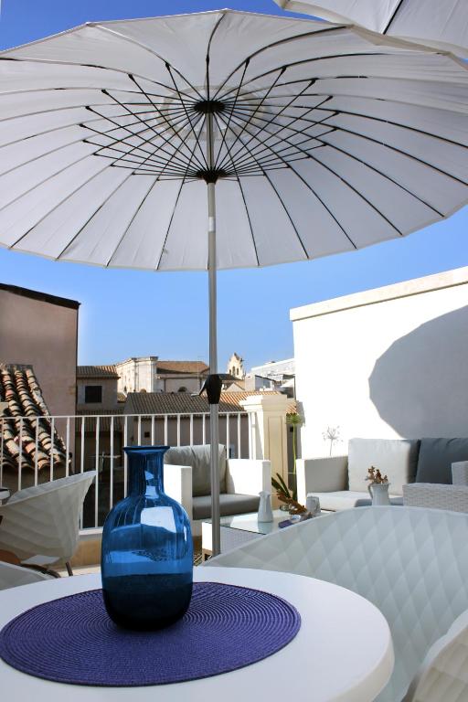 Posezení v ubytování CinqueSuites Ortigia