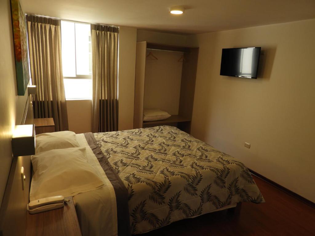 TV a/nebo společenská místnost v ubytování Nice Inn Tacna