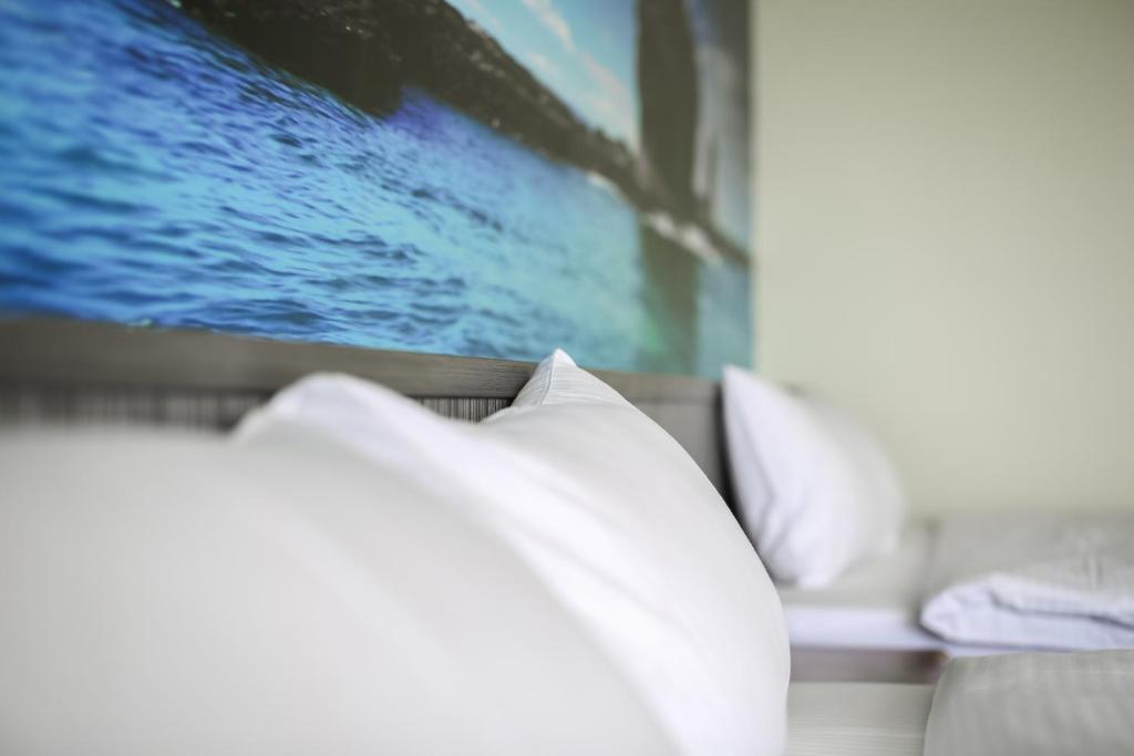 Postel nebo postele na pokoji v ubytování Bo Heng B&B