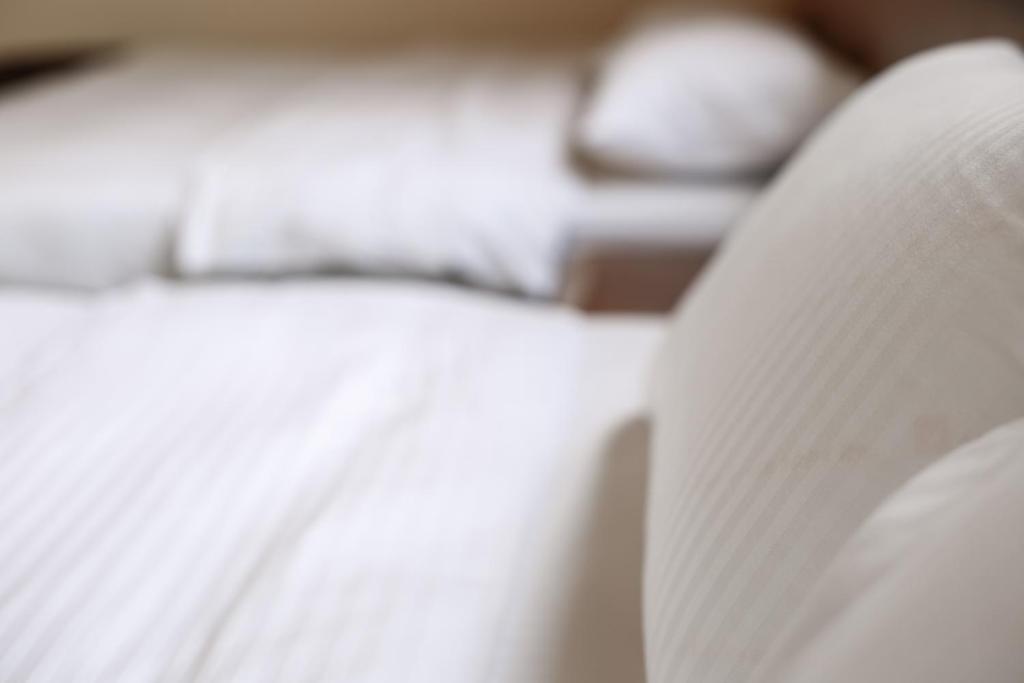 Postel nebo postele na pokoji v ubytování Bo Heng B&B