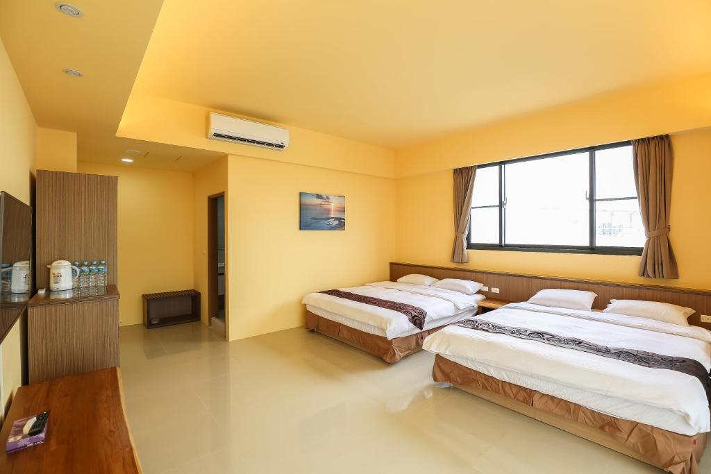 Postel nebo postele na pokoji v ubytování Bo Heng B&B