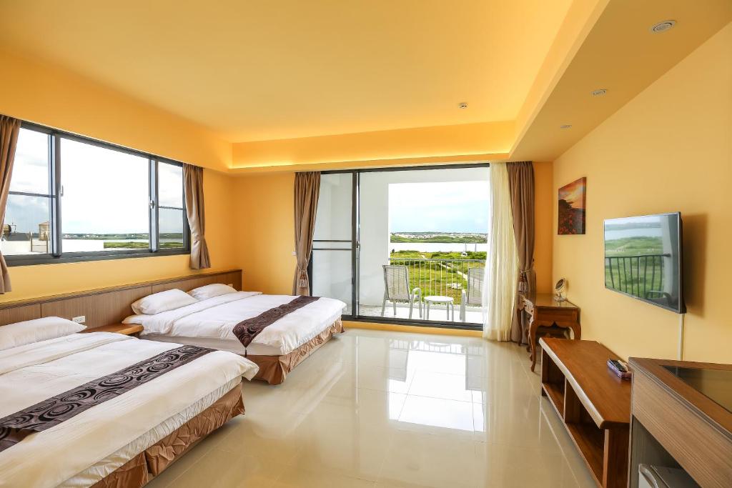 Postel nebo postele na pokoji v ubytování Bo Heng B&B