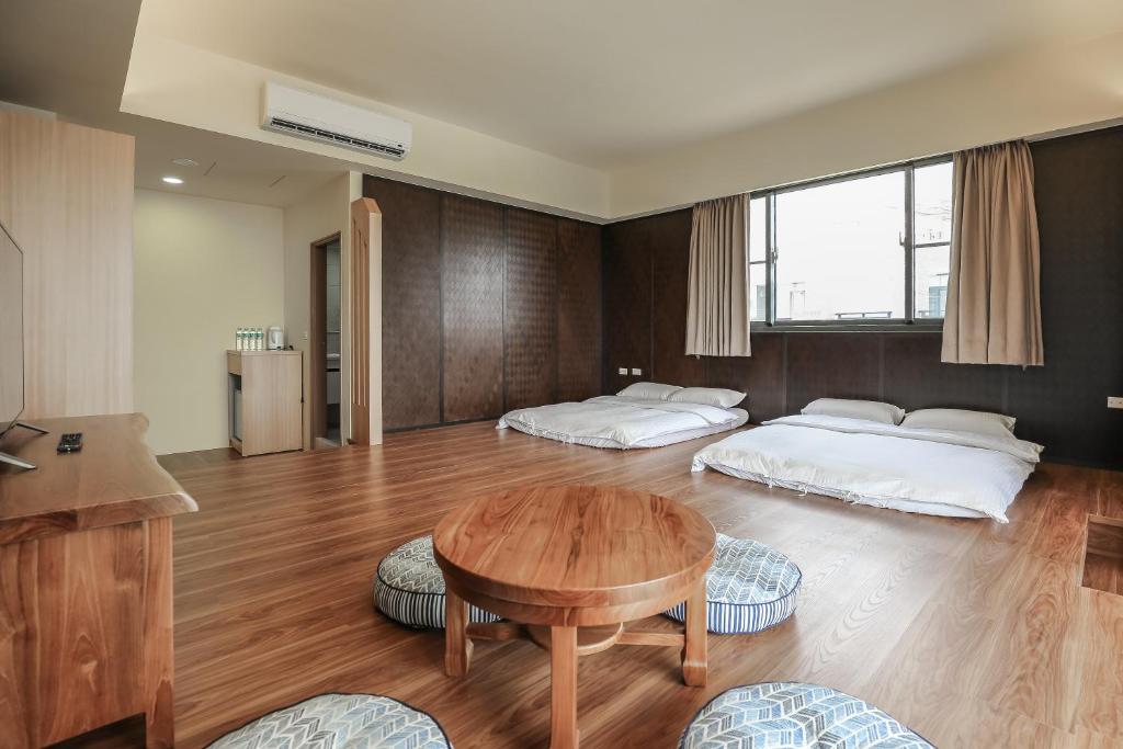 Postel nebo postele na pokoji v ubytování Bo Heng B&B