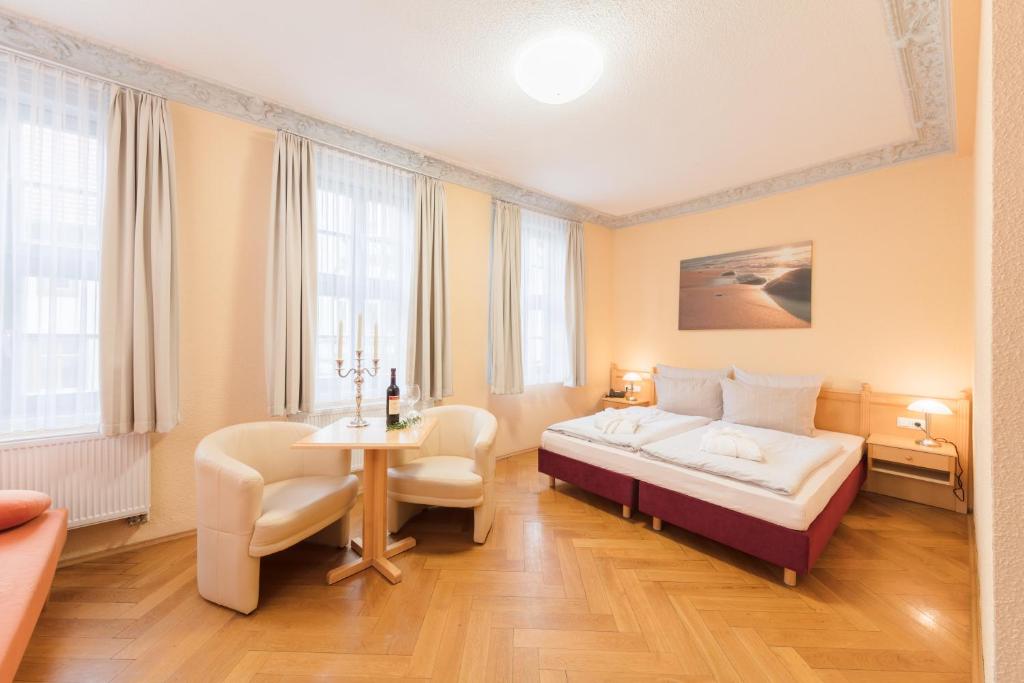 Voodi või voodid majutusasutuse Hotel Mühlhäuser Hof toas
