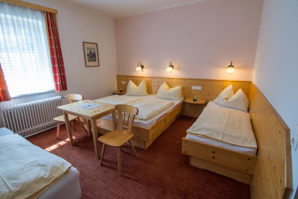 Postel nebo postele na pokoji v ubytování Triebenerhof