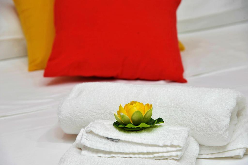 Łóżko lub łóżka w pokoju w obiekcie B&B Cornelia