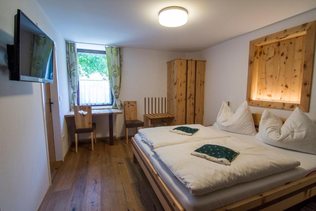 Postel nebo postele na pokoji v ubytování Triebenerhof