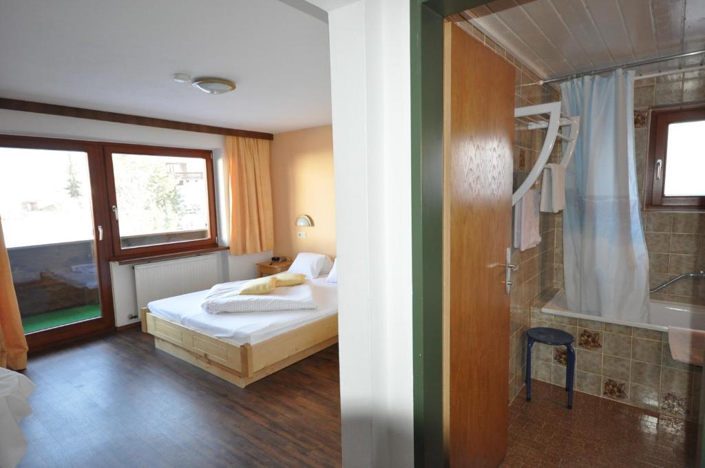 Postel nebo postele na pokoji v ubytování Haus Bergfrieden
