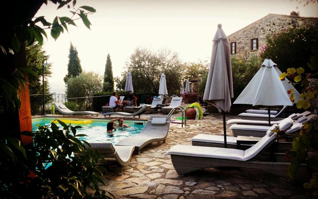 Bazén v ubytování Podere Palazzolo (ADULTS ONLY) nebo v jeho okolí