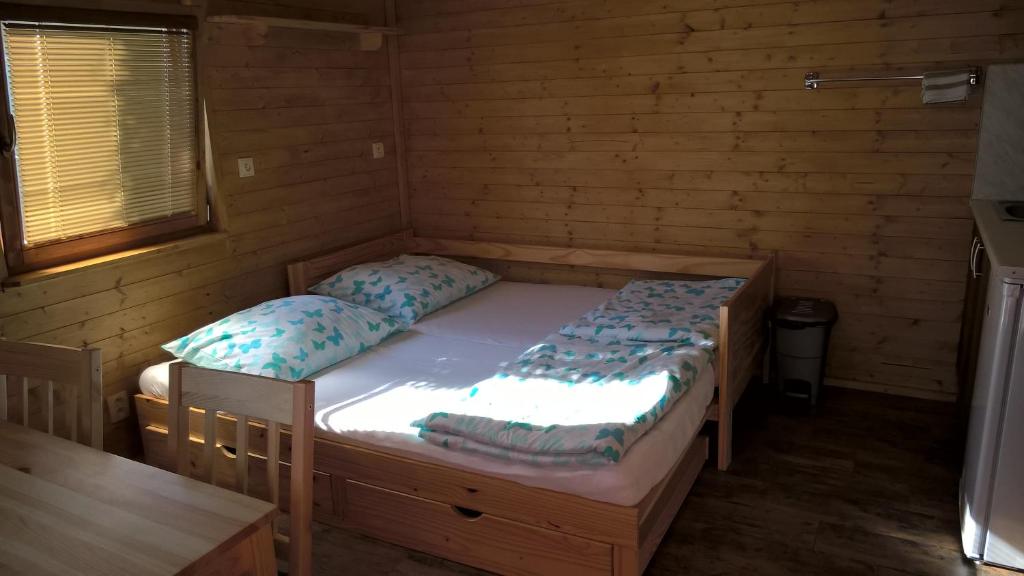 Postel nebo postele na pokoji v ubytování Chata Nový Přerov
